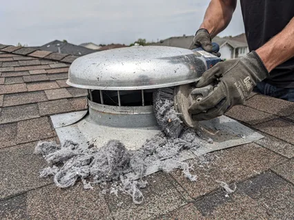 Cleaning Dryer Vent On Roof in Duarte